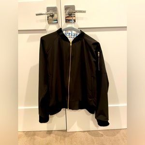 Women’s black bomber jacket. Like new condition.